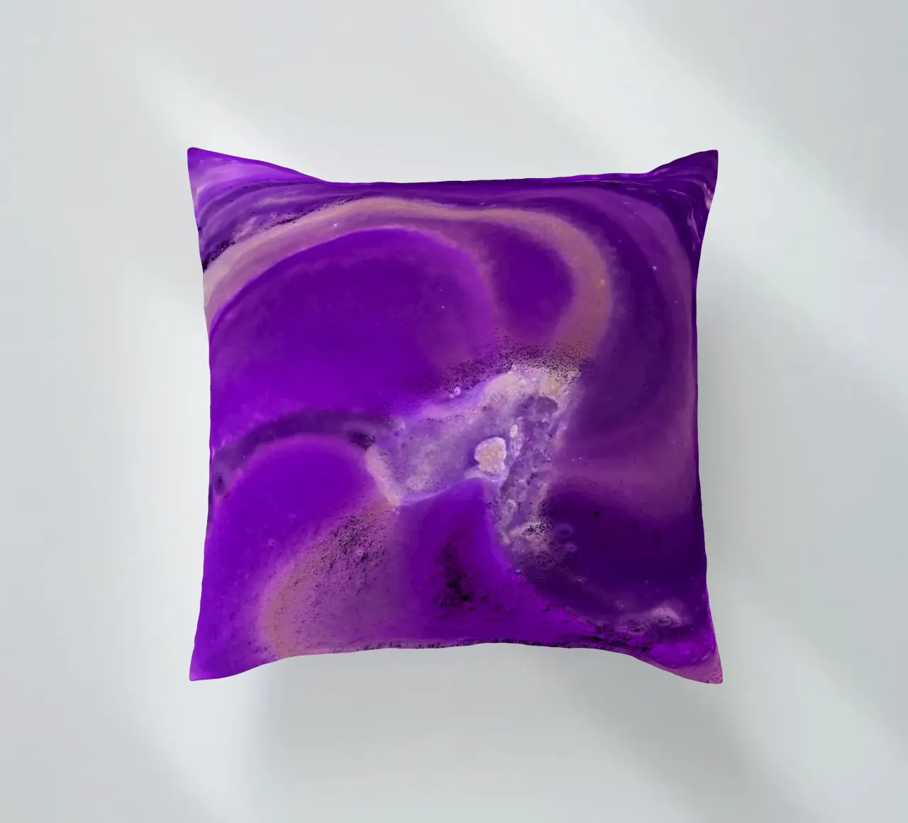Purple decorative cushion by Massimo Frascogna
