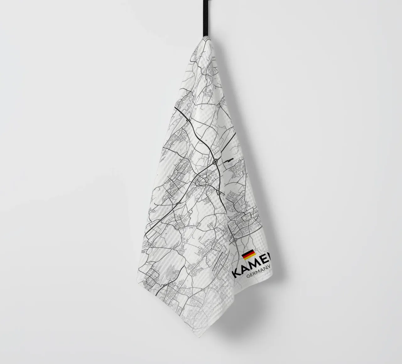 Kamen DE tea towel by Christopher Adams