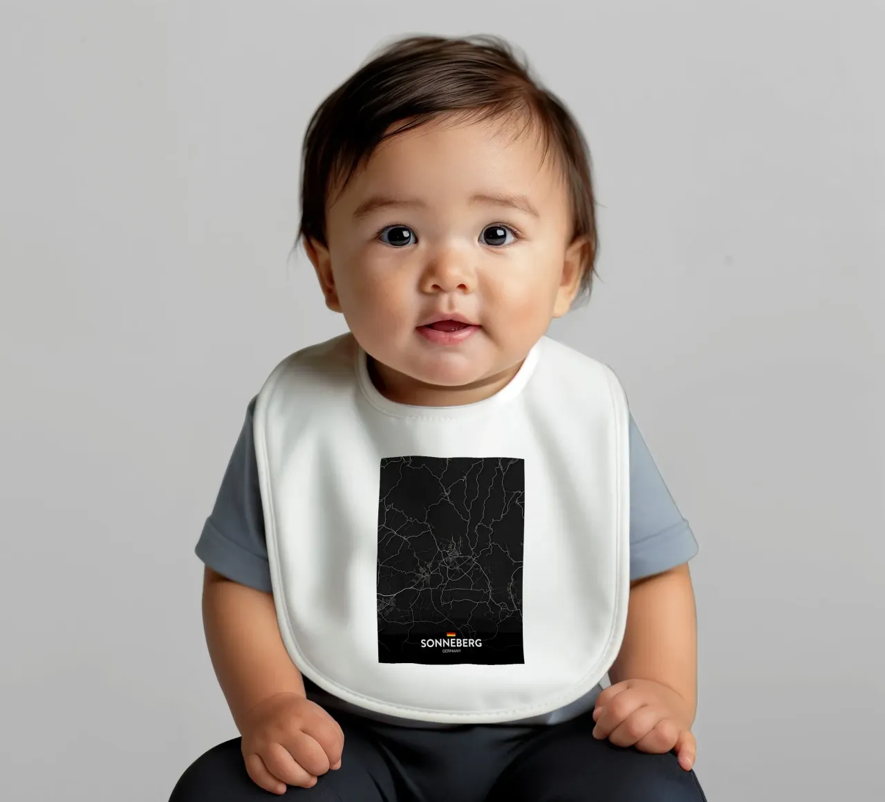 Sonneberg DE baby bib by Christopher Adams