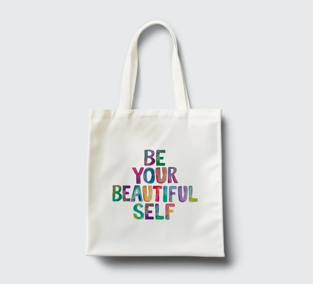 Be Your Beautiful Self - Design tipografico arcobaleno per bambini borsa in juta da THE MOTIVATED TYPE