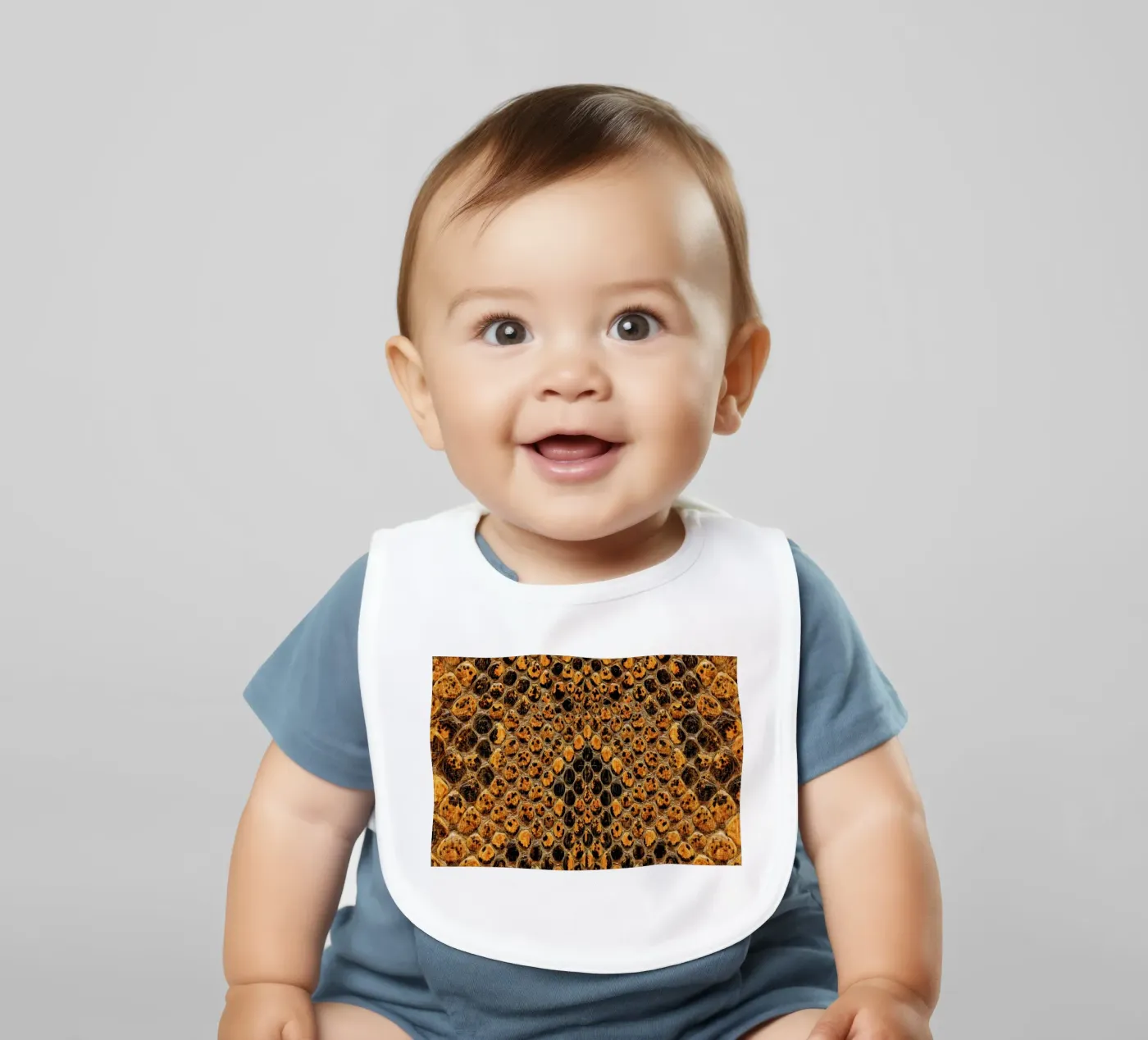 Snake Pattern baby bib by Curious Collections by Marielle Leenders