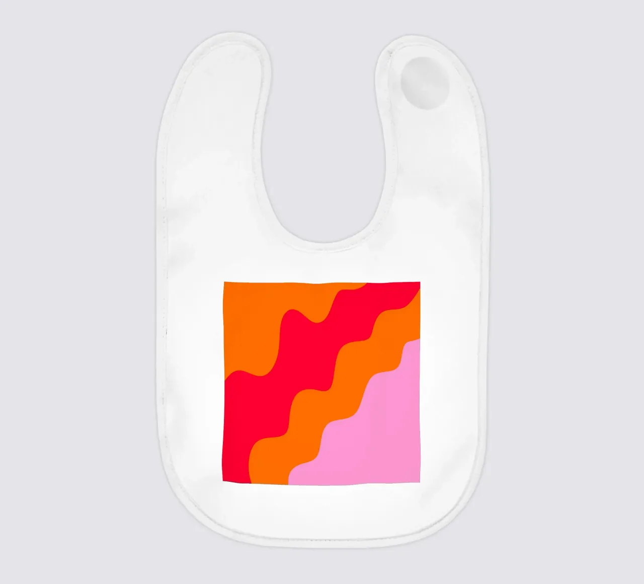 Color blocking formes ondulées rose, rouge, orange bavoir de Wackapacka