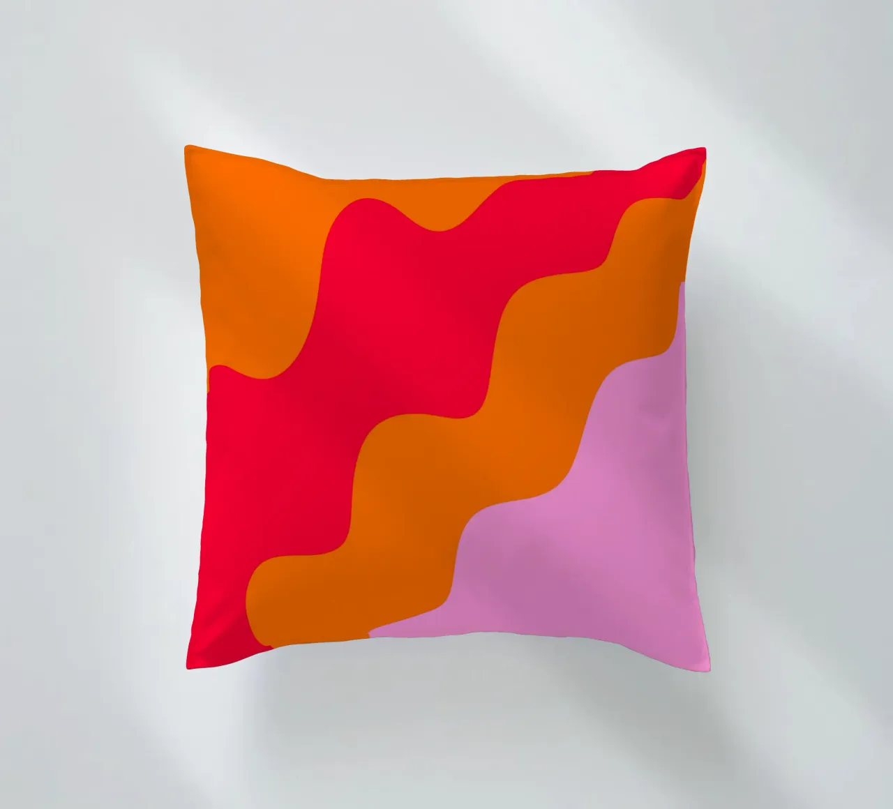 Color blocking wavy shapes pink, red, orange decorative cushion by Wackapacka