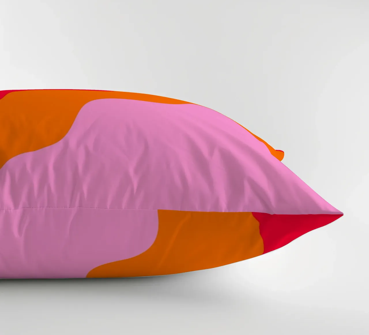Color blocking wavy shapes pink, red, orange decorative cushion by Wackapacka