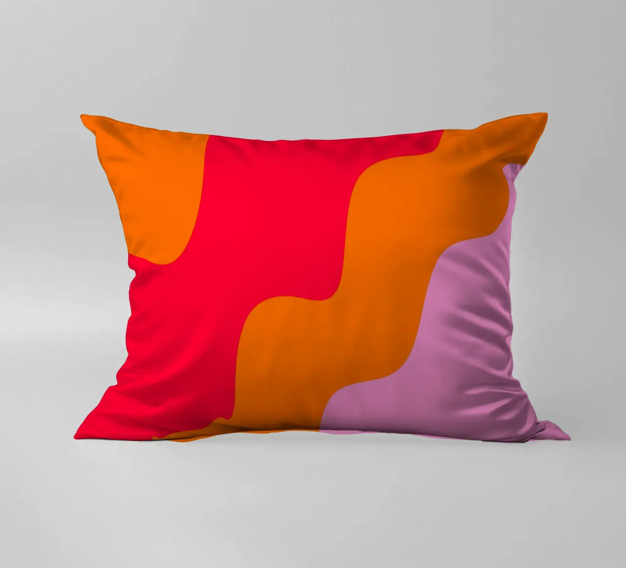 Color blocking wavy shapes pink, red, orange decorative cushion by Wackapacka