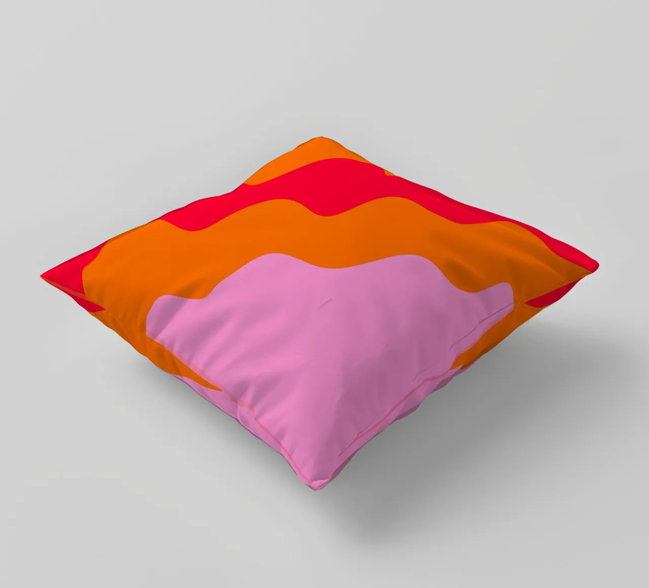 Kleurblok golvende vormen roze, rood, oranje kussen van Wackapacka