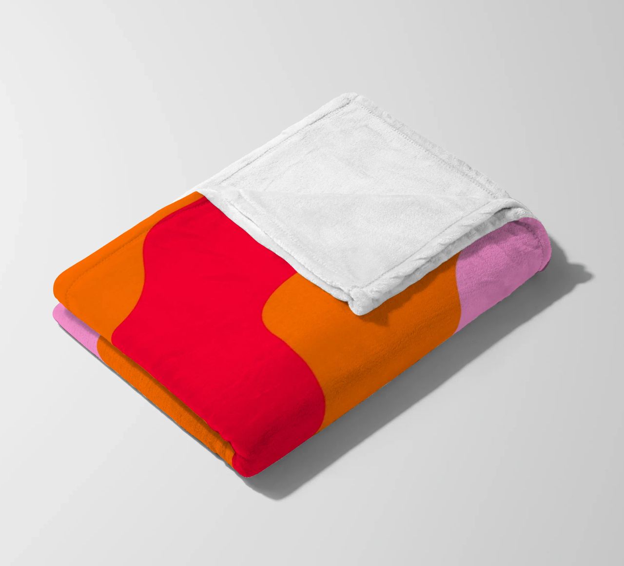 Forme ondulate in color blocking rosa, rosso, arancione coperta in pile da Wackapacka