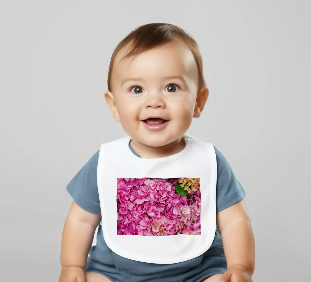 Hortensia Pink baby bib by Curious Collections by Marielle Leenders