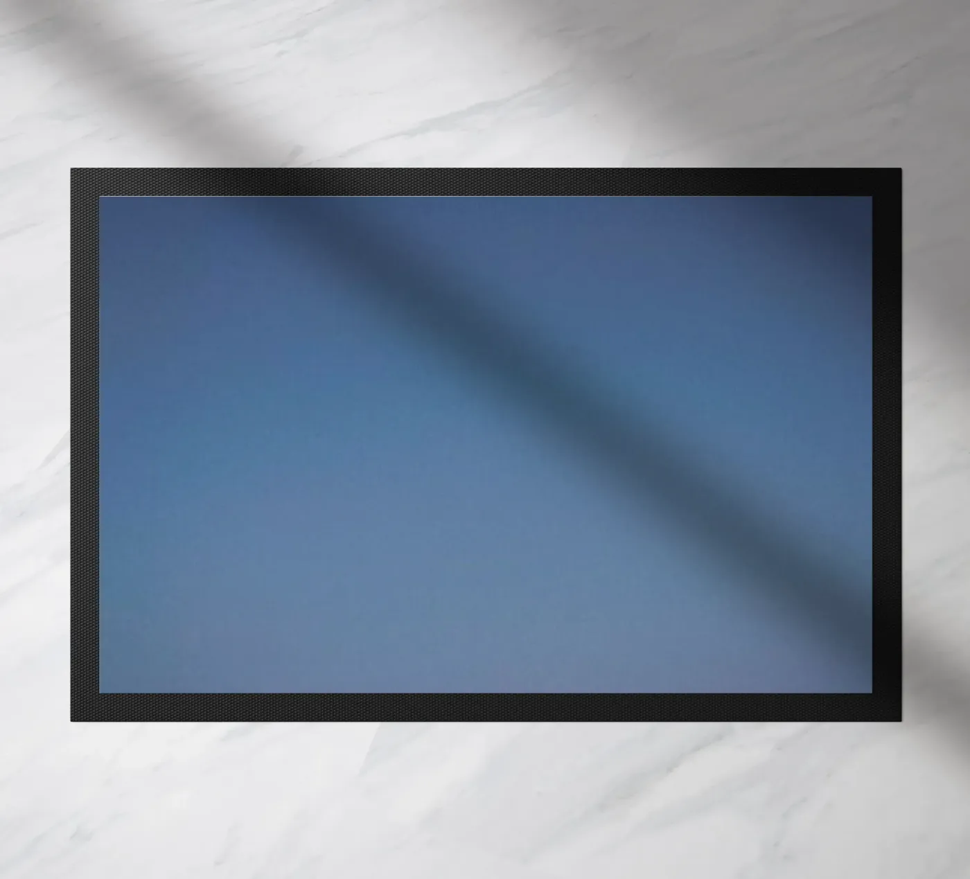 Blue doormat by Chris Abatzis