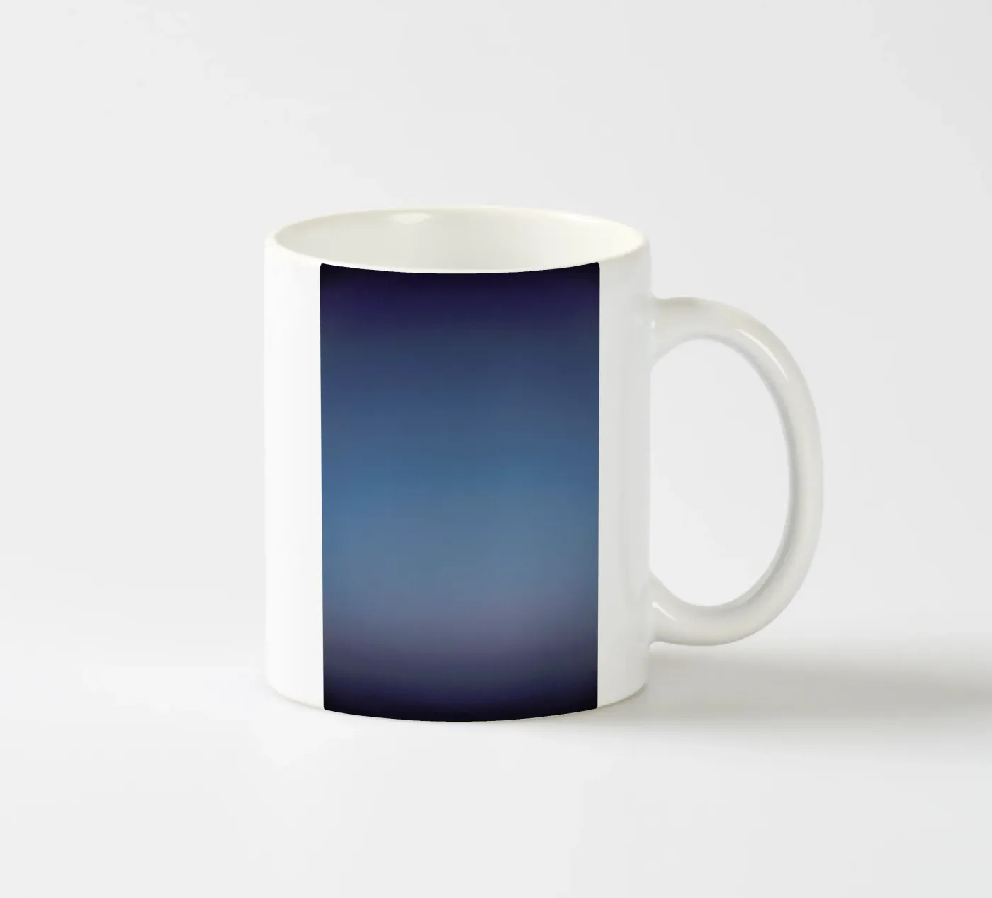 Blue ceramic mug by Chris Abatzis