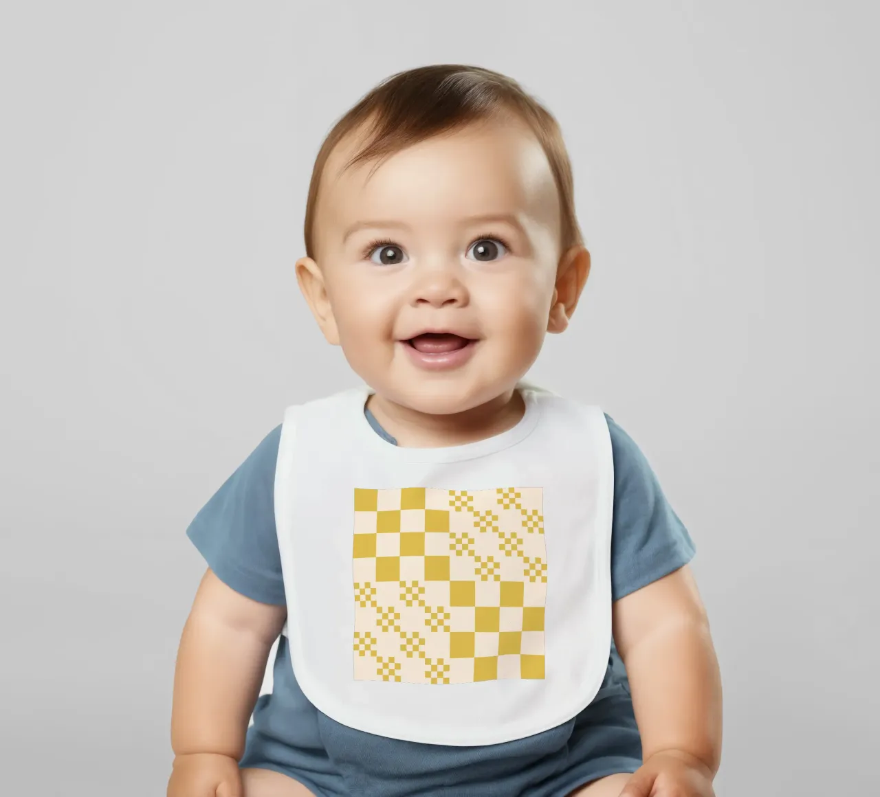 Funky grid pattern baby bib by Wackapacka