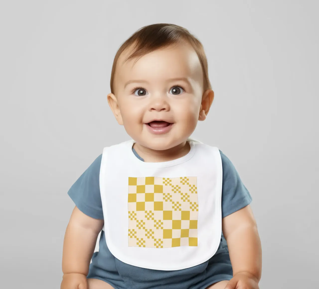 Funky grid pattern baby bib by Wackapacka
