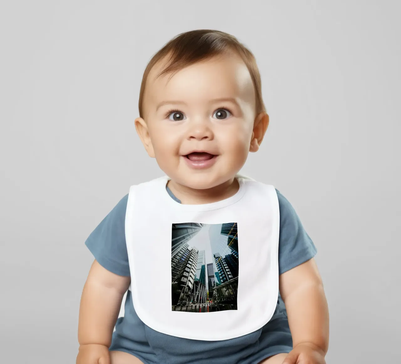 57 City baby bib by Bttn