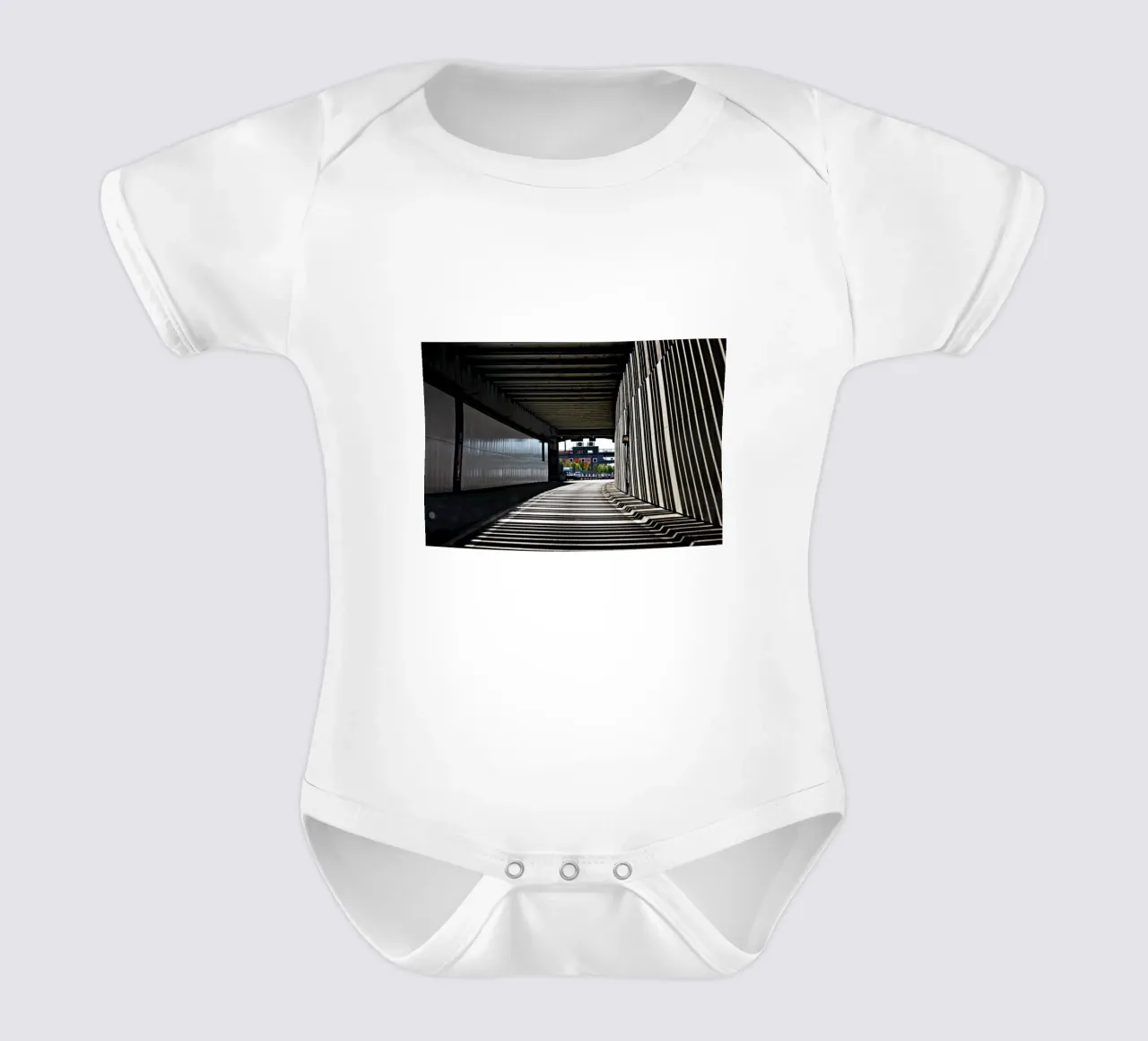 60 City short-sleeve baby romper by Bttn