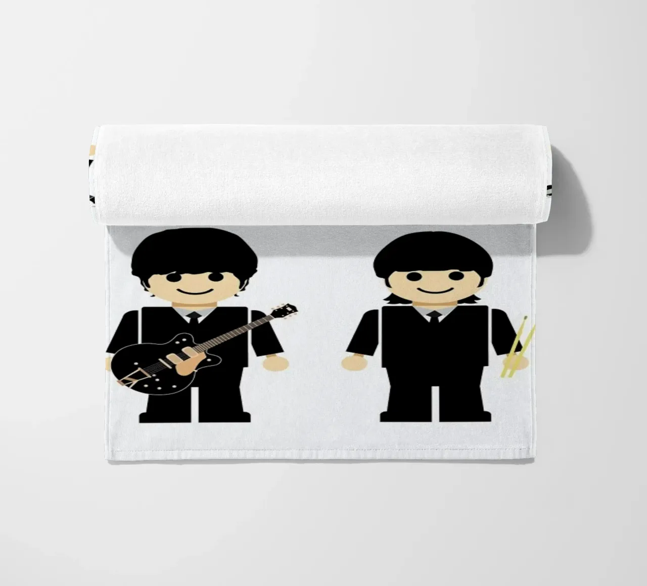 The Beatles Toy beach towel by Rafa Gomes
