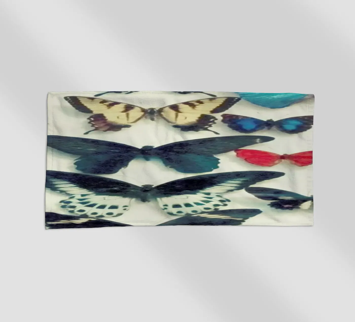 Wings beach towel by Cassia Beck Photography