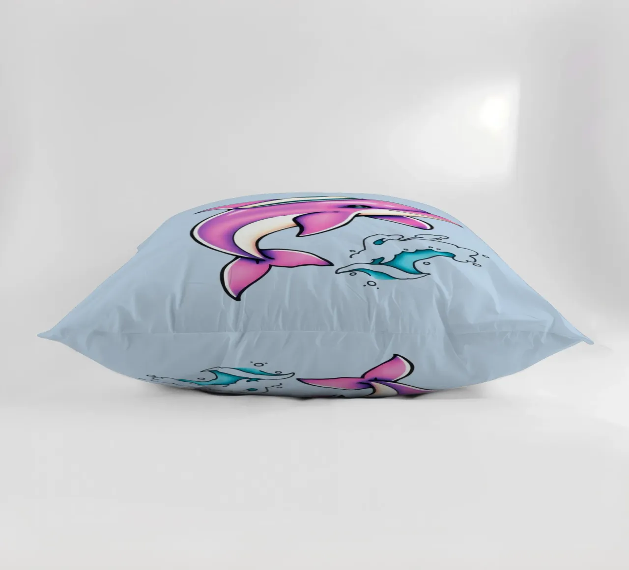 Playful pink dolphin wearing a hat jumps through waves decorative cushion by DesignDoodle