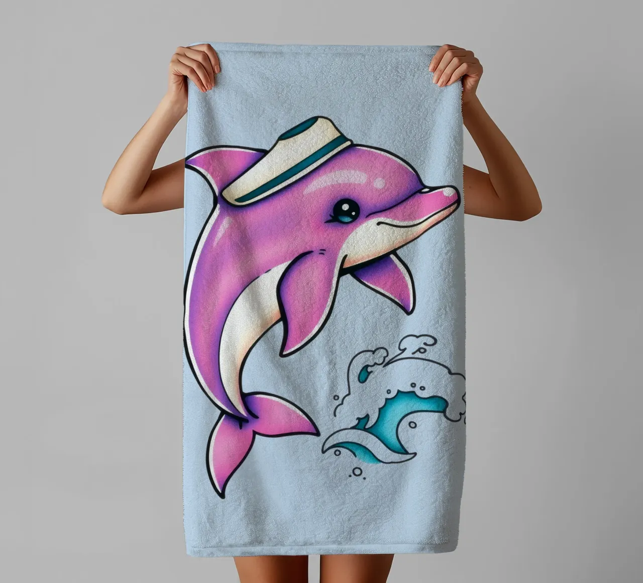Speelse roze dolfijn met hoed springt door de golven badhanddoek van DesignDoodle