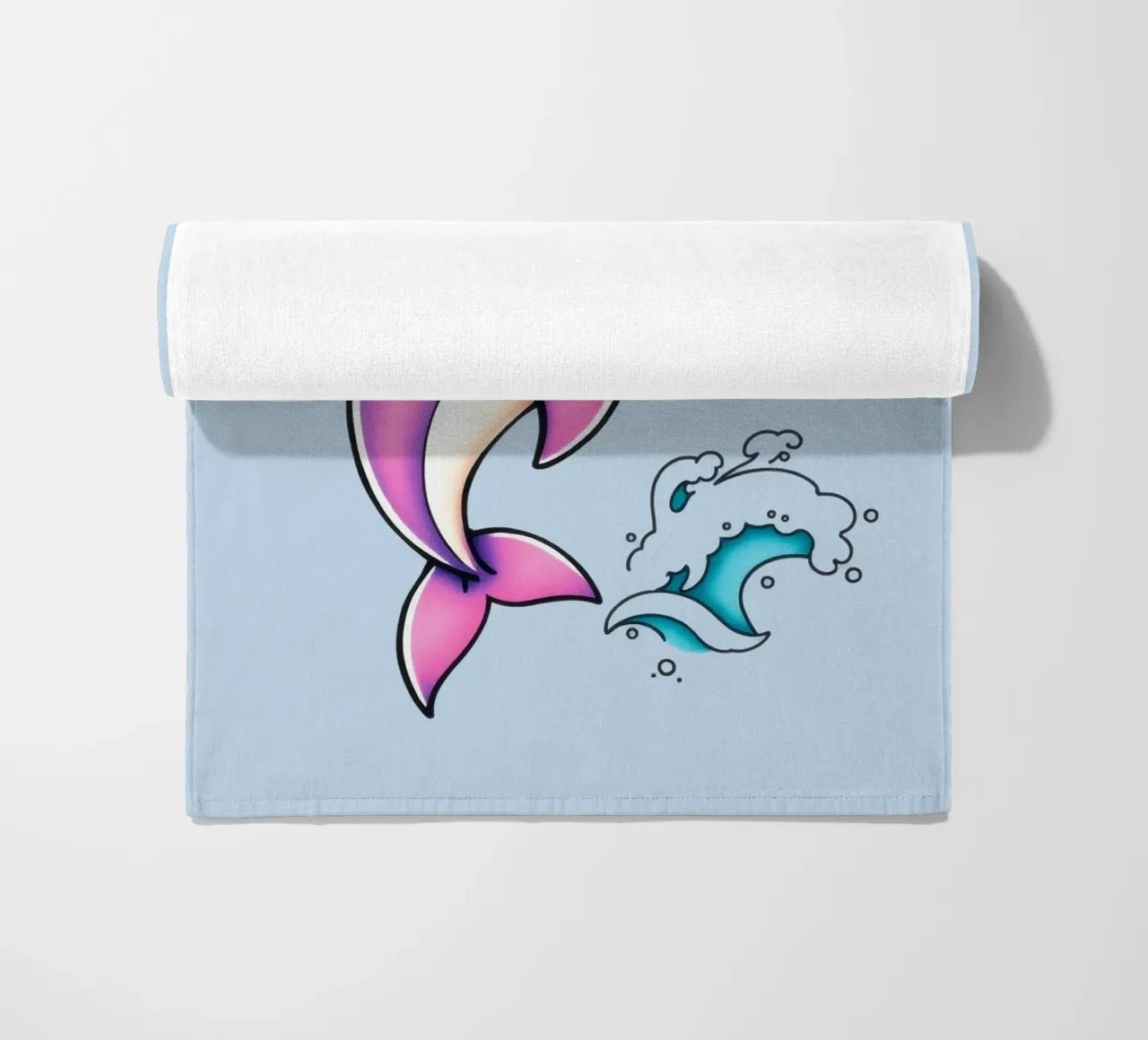 Playful pink dolphin wearing a hat jumps through waves beach towel by DesignDoodle