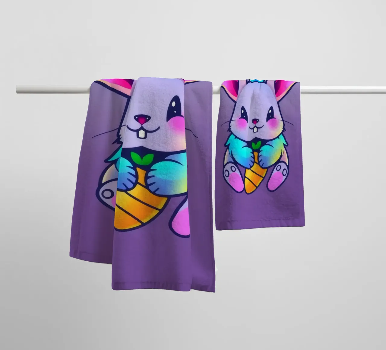 cartoon rabbit with a crown and a carrot on a vibrant purple towel by DesignDoodle