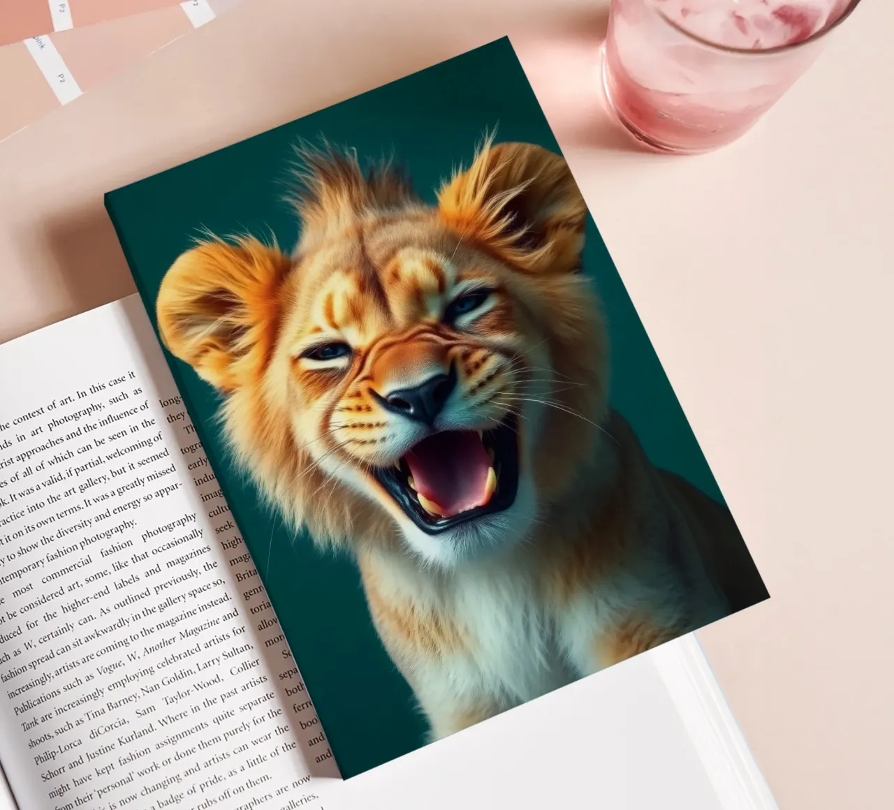 Lion cub displays playful energy with a joyful expression notebook by DesignDoodle