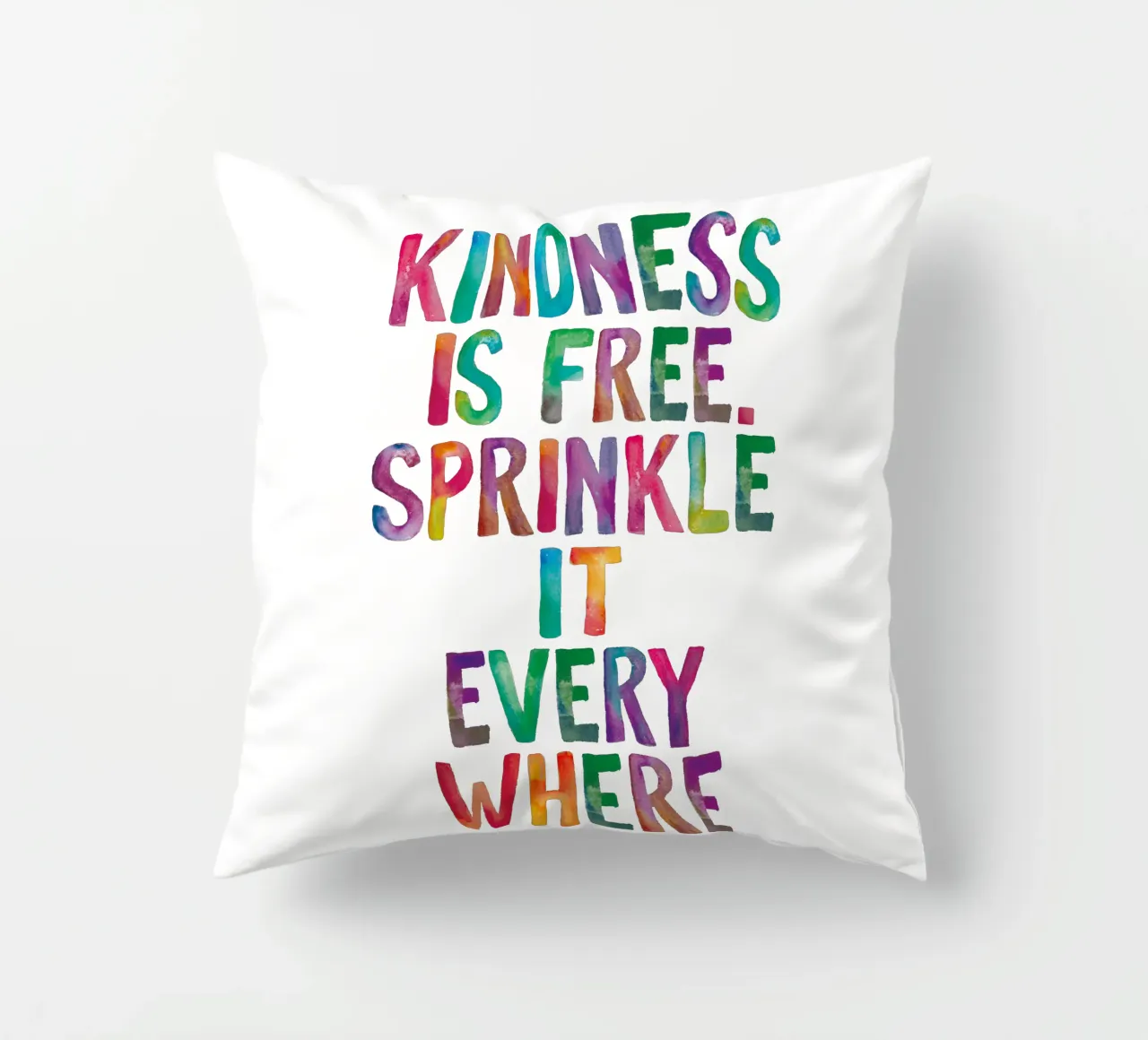 La gentilezza è gratuita, cospargetela ovunque Regenbogen Design cuscino da THE MOTIVATED TYPE