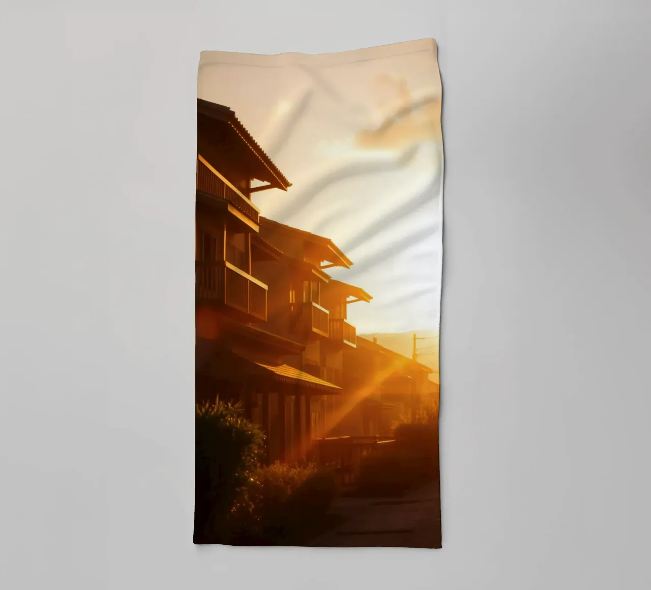 Beautiful sunset illuminating residential homes towel by DesignDoodle