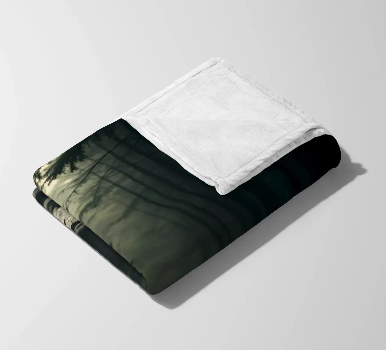 Misty forest path with soft light filters through tall trees fleece blanket by DesignDoodle