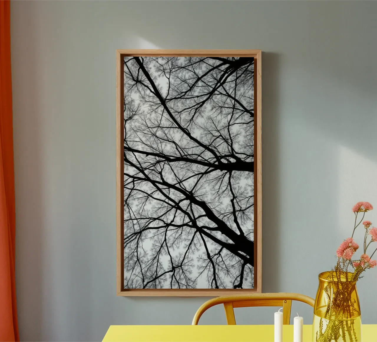 Lifeless branches stretch against a cloudy sky canvas with Floater frame by DesignDoodle