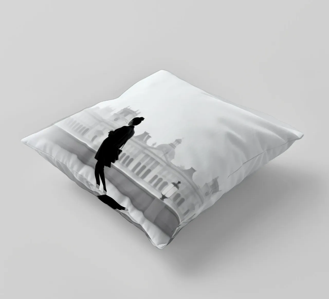Elegante silhouette di una persona che cammina in città cuscino da DesignDoodle