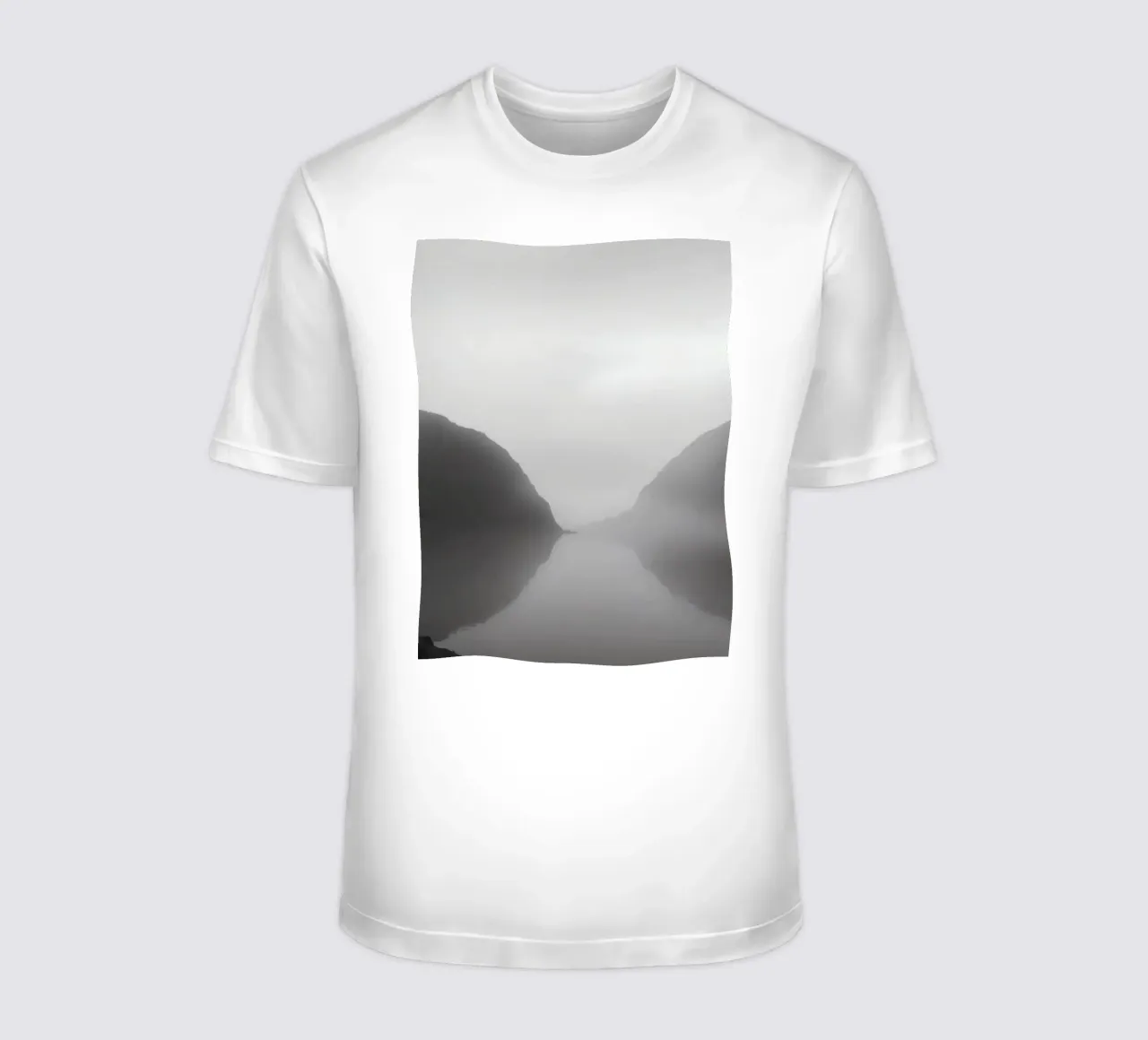 Misty mountain landscape with calm waters reflecting t-shirt by DesignDoodle