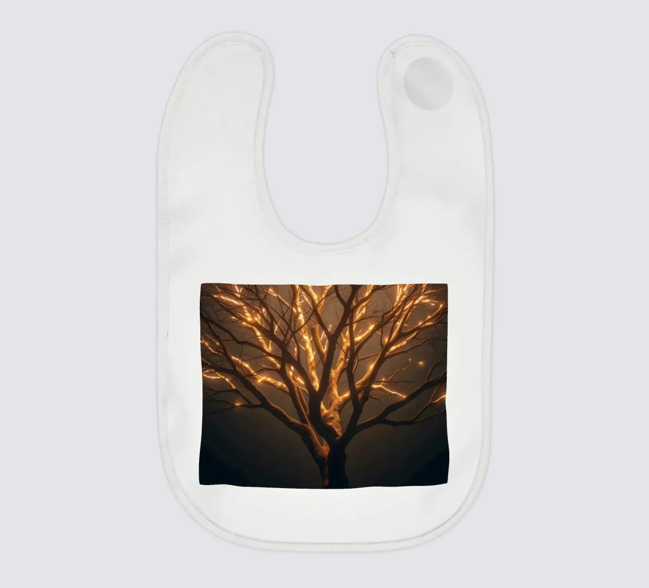 Brightly lit tree branches create a captivating abstract baby bib by DesignDoodle