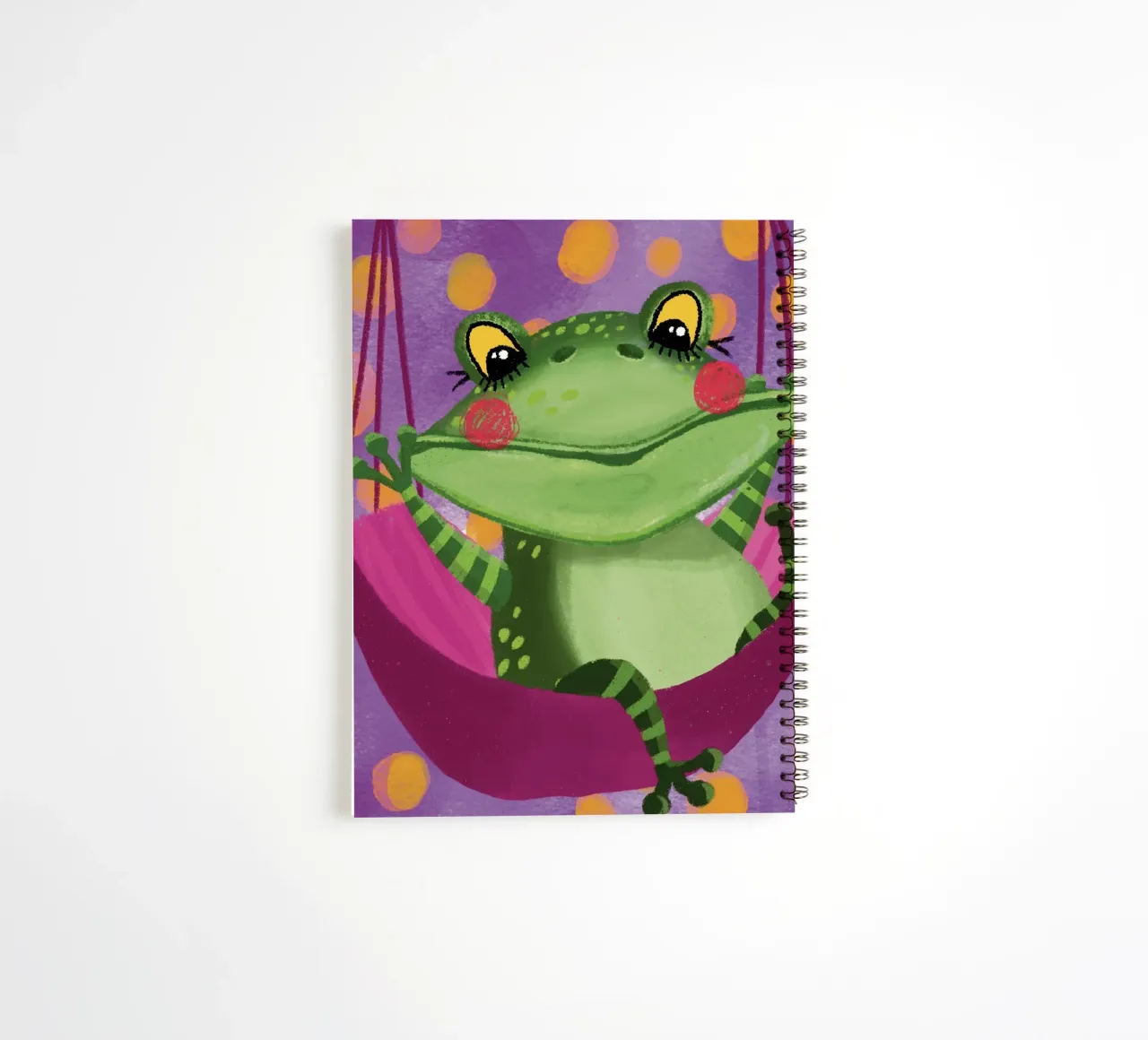Funny frog swings in the hammock spiral notebook by Honigbrombeere
