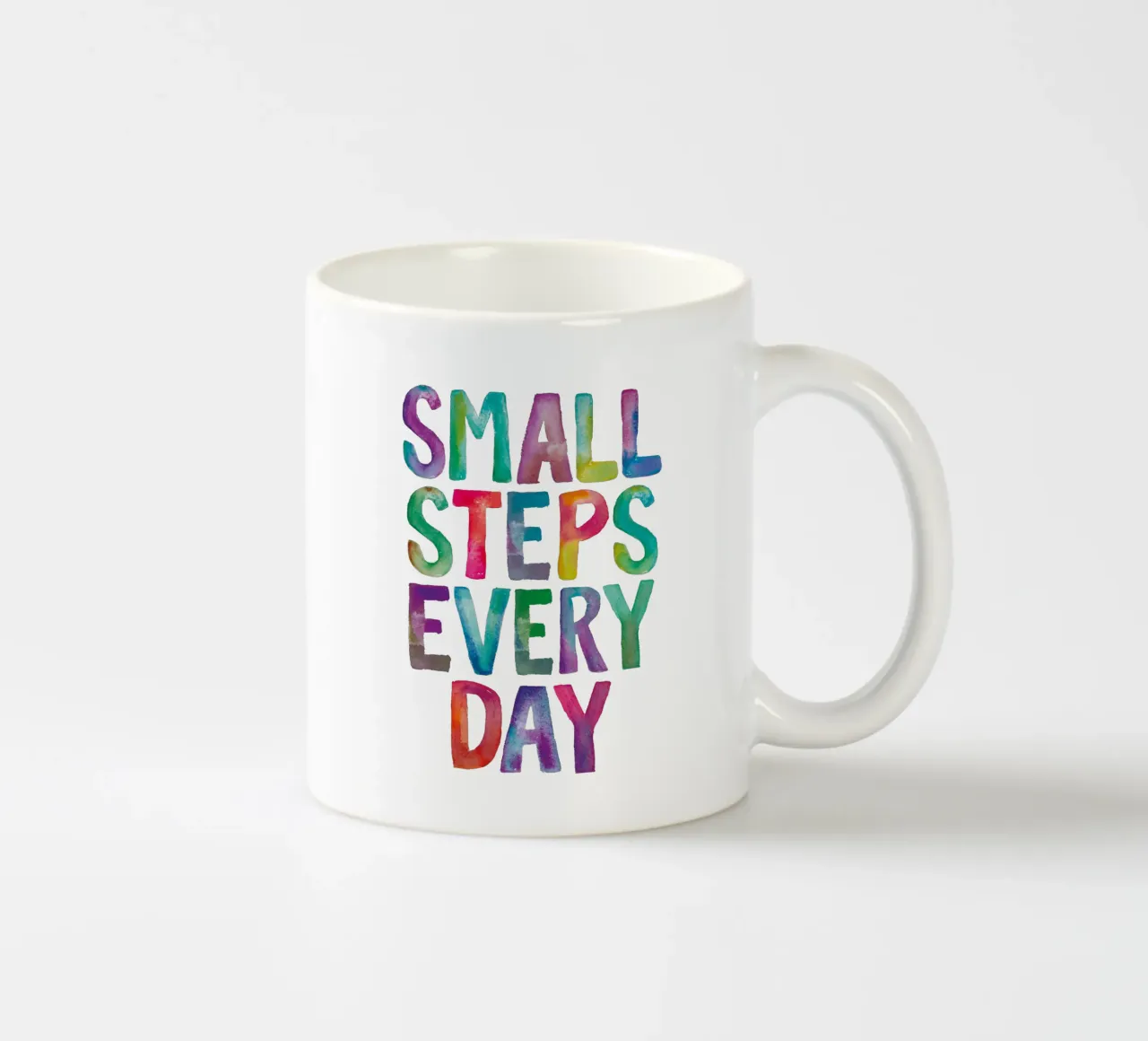 Small Steps Every Day Arc-en-ciel Unicorn Typographie Design mug en céramique de THE MOTIVATED TYPE