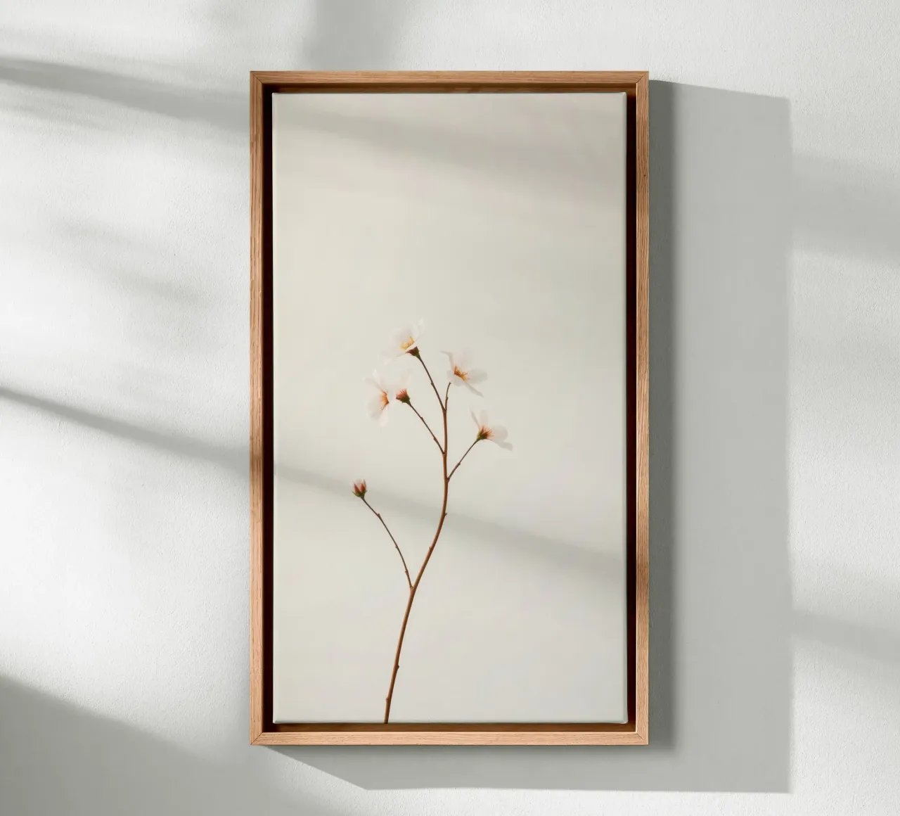 Delicate floral branch against a soft neutral background canvas with Floater frame by DesignDoodle