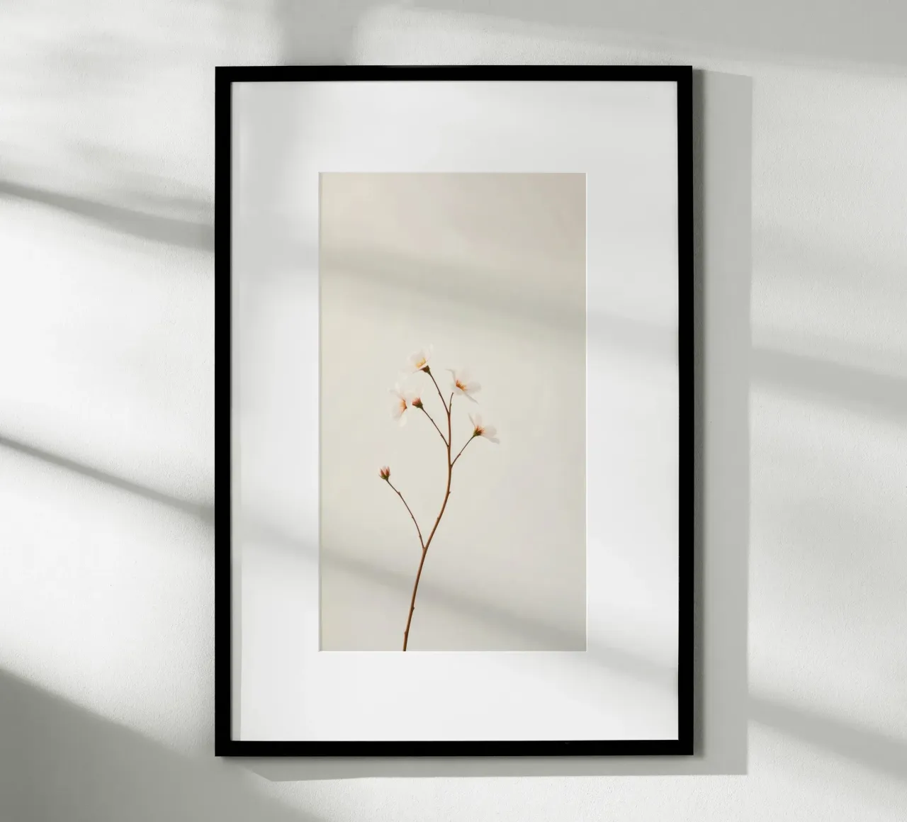 Zarter Blumenzweig vor einem weichen, neutralen Hintergrund Poster mit Holzrahmen von DesignDoodle