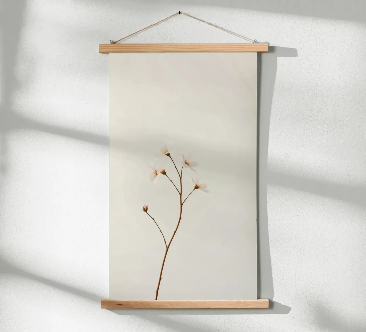 Zarter Blumenzweig vor einem weichen, neutralen Hintergrund Poster mit Holzrahmen von DesignDoodle