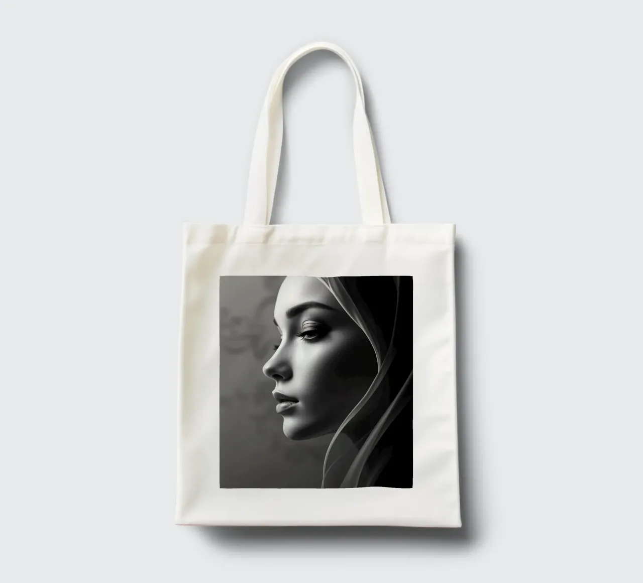 Elegant black and white portrait with soft fabric draping tote bag by DesignDoodle