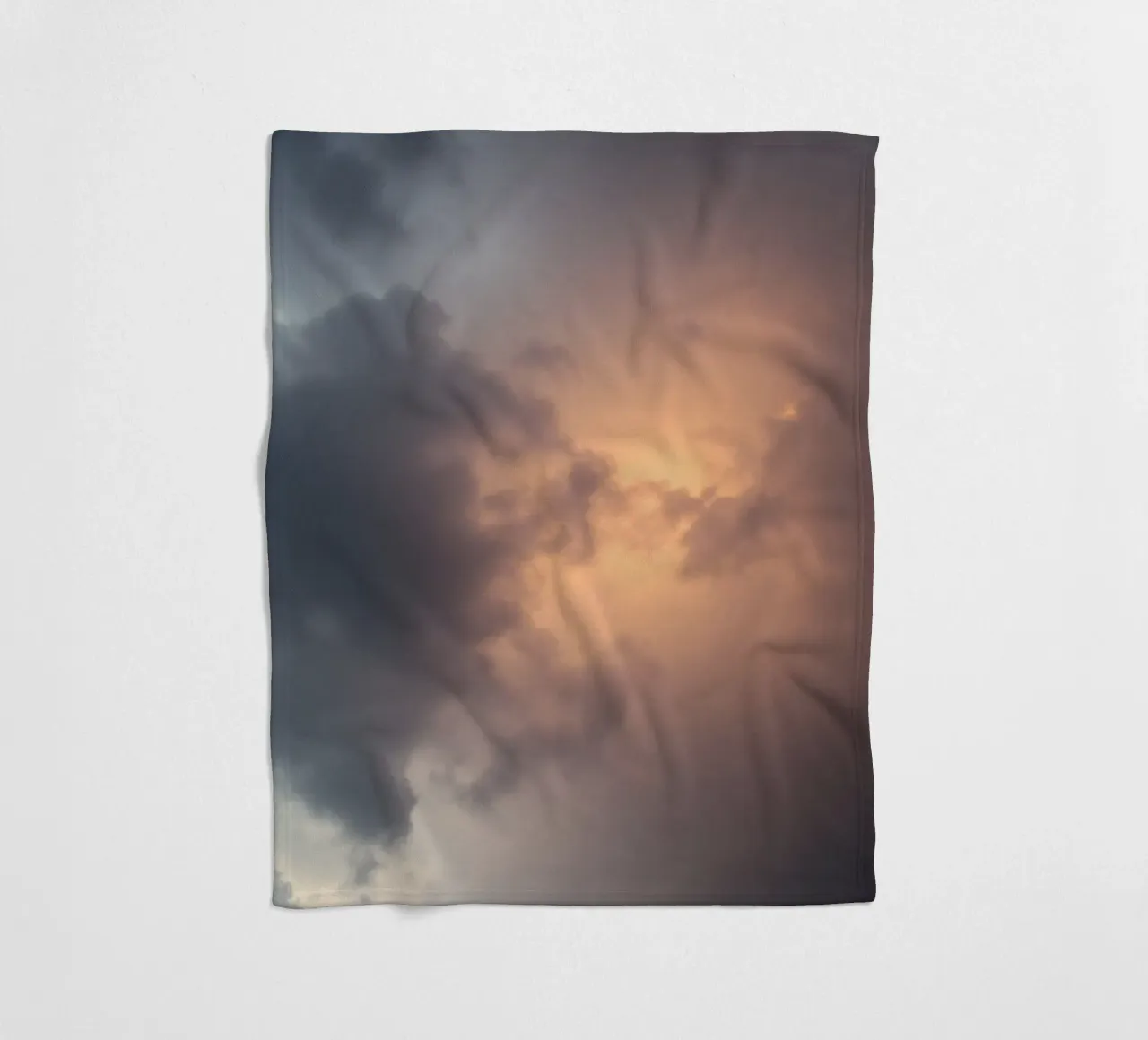 Soft hues of twilight emerge through clouds fleece blanket by DesignDoodle