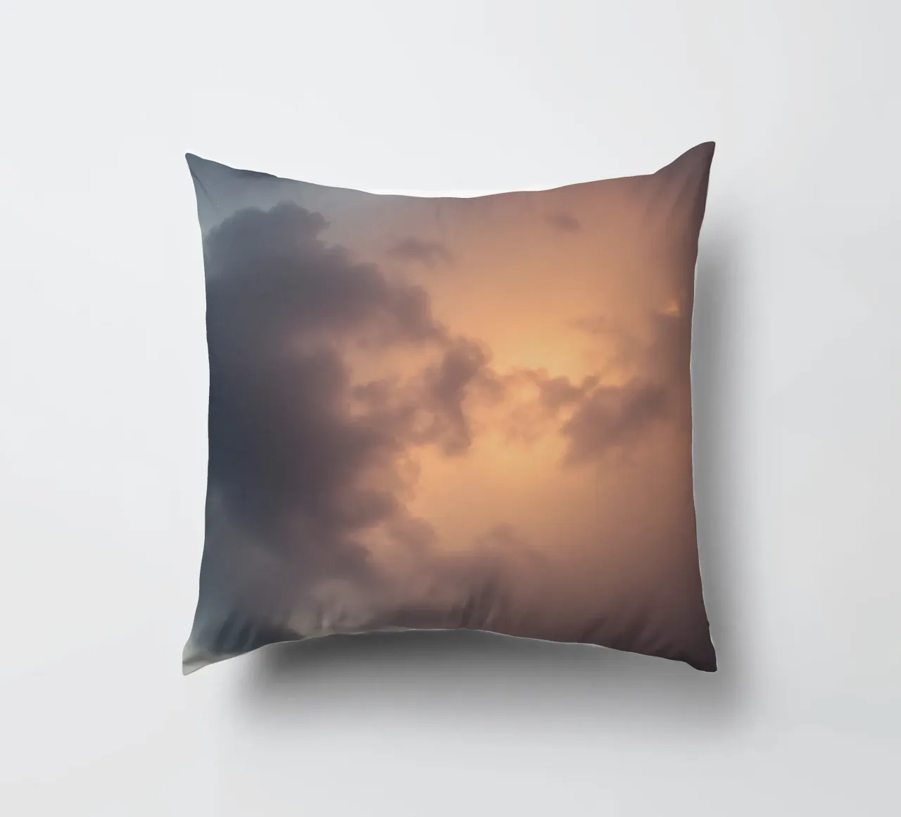 Soft hues of twilight emerge through clouds decorative cushion by DesignDoodle