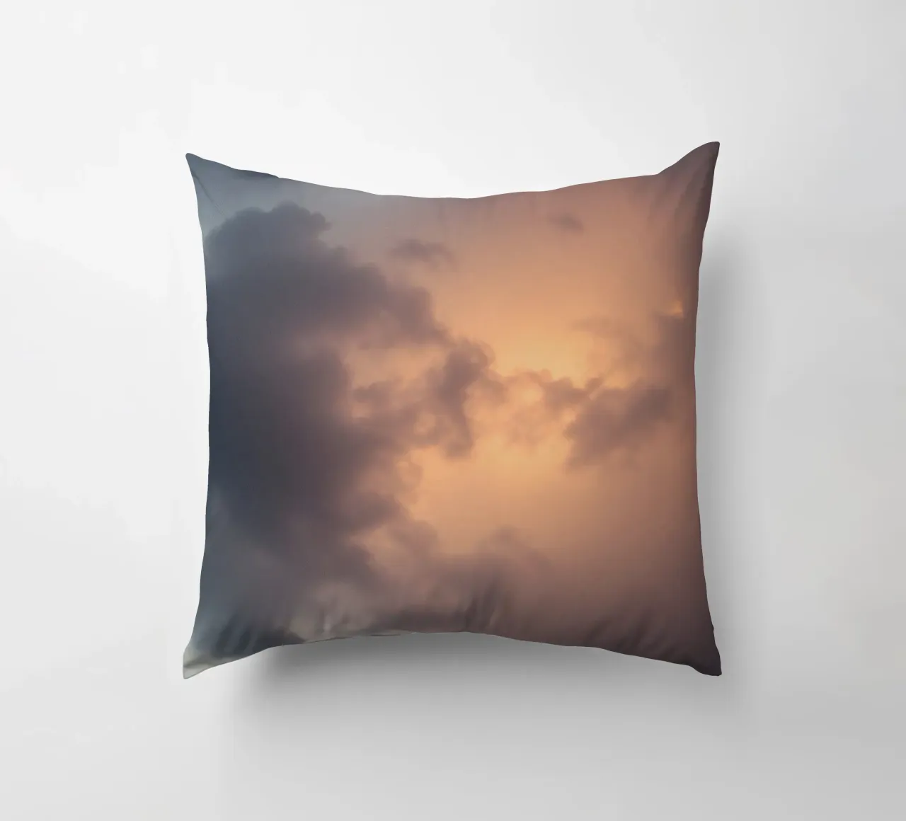 Soft hues of twilight emerge through clouds decorative cushion by DesignDoodle