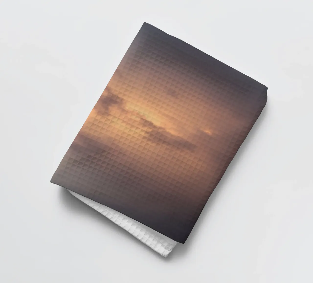 Soft hues of twilight emerge through clouds tea towel by DesignDoodle