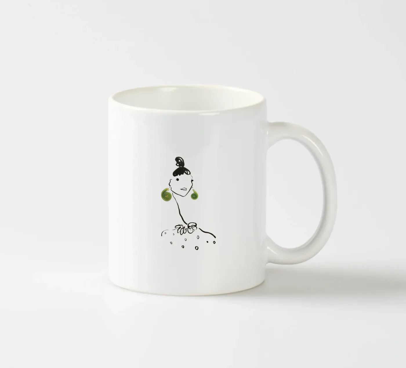 Fiddlehead ceramic mug by Gretchen Roehrs