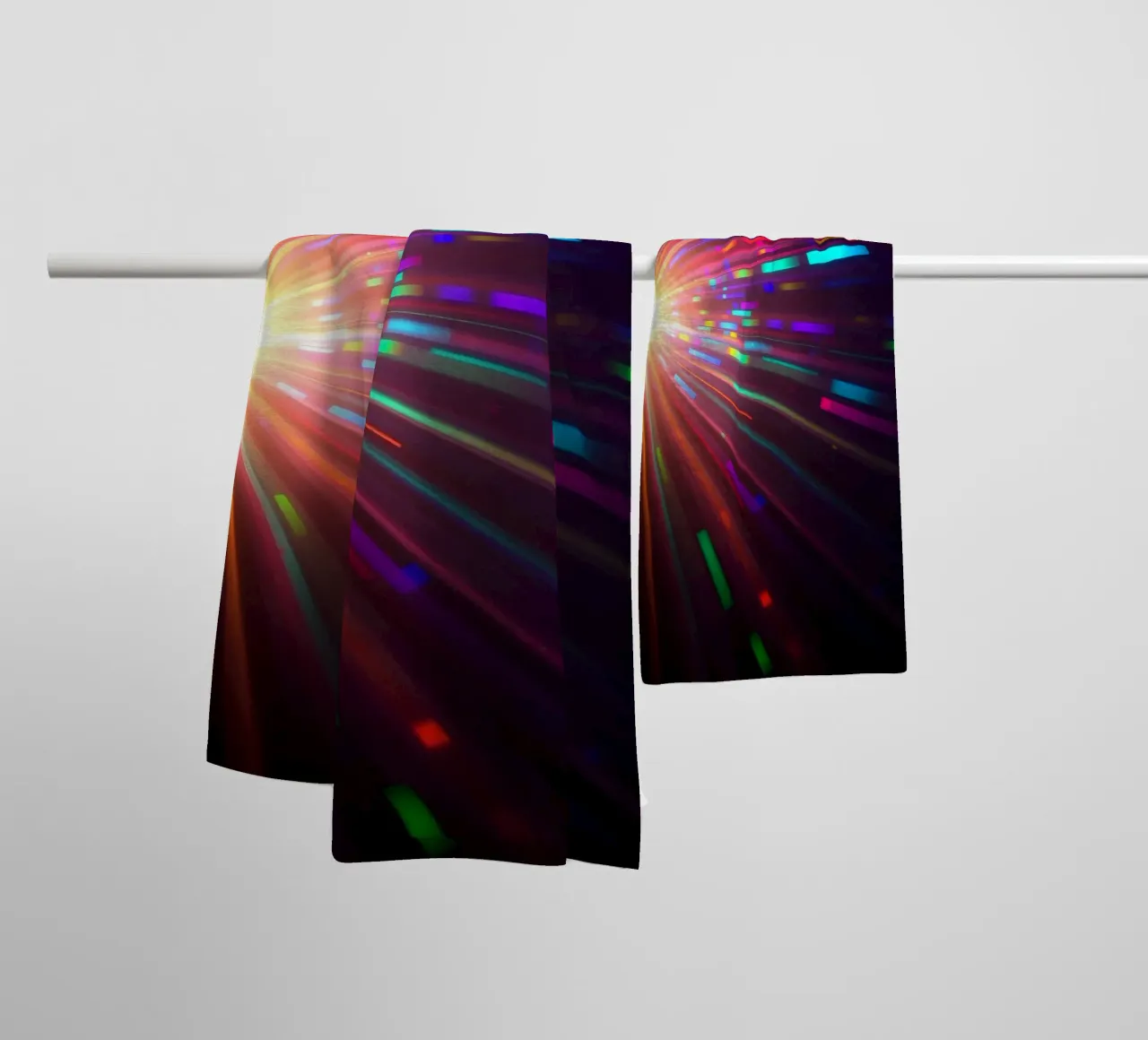 Vibrant abstract light rays radiate from a central point towel by DesignDoodle