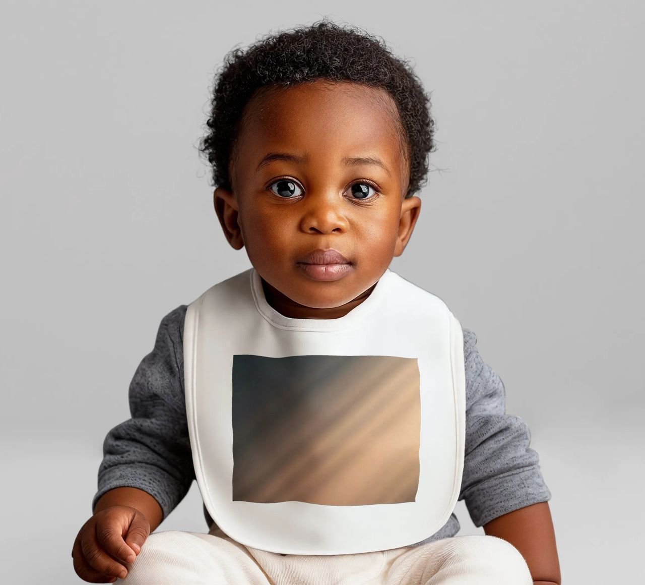 Soft gradient background with abstract light patterns baby bib by DesignDoodle