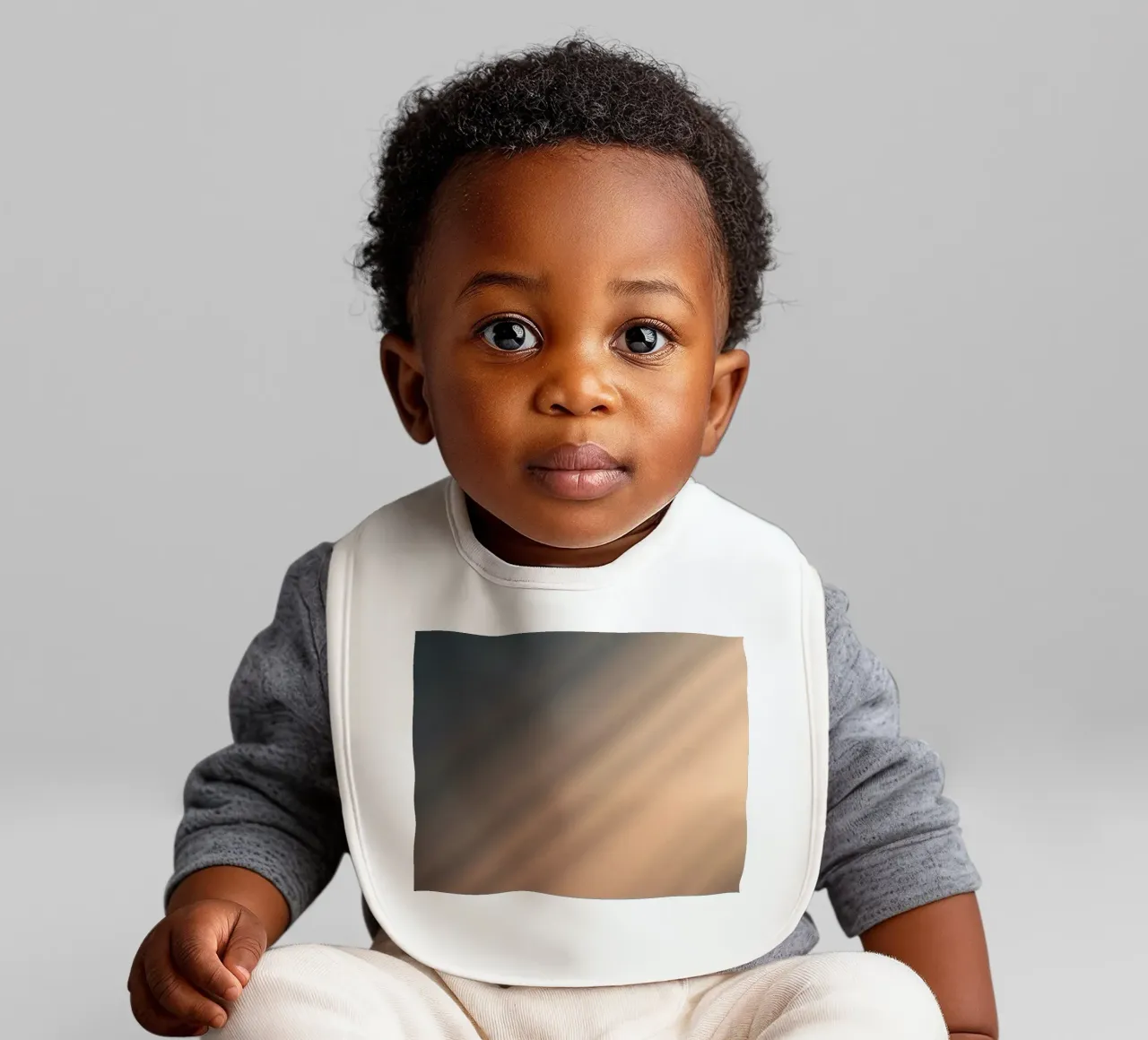 Soft gradient background with abstract light patterns baby bib by DesignDoodle