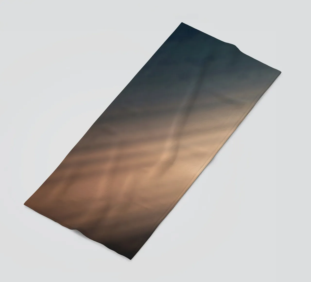 Soft gradient background with abstract light patterns beach towel by DesignDoodle