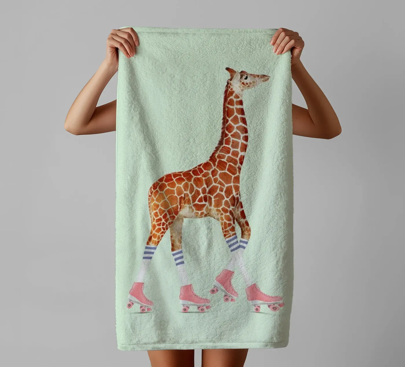Rollerskating Giraffe towel by Jonas Loose