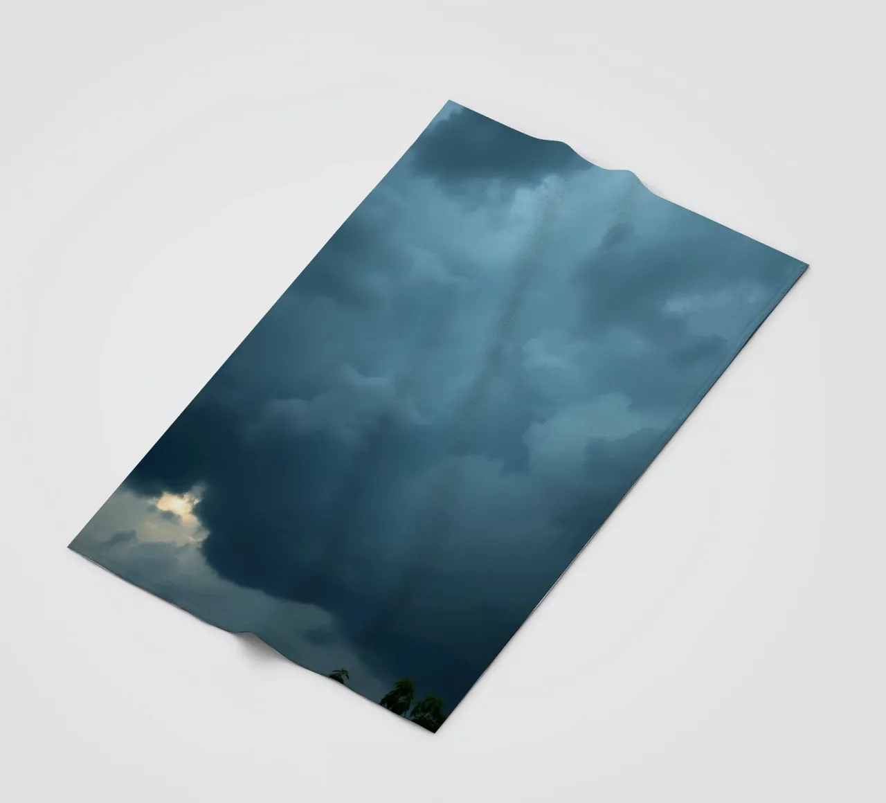 Dark and moody clouds gathering in the dramatic sky fleece blanket by DesignDoodle