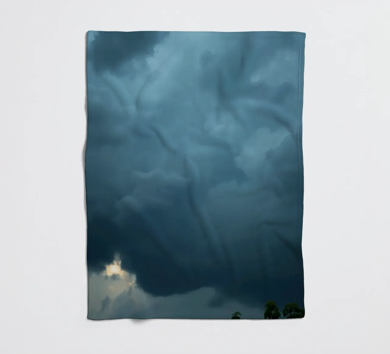 Dark and moody clouds gathering in the dramatic sky fleece blanket by DesignDoodle